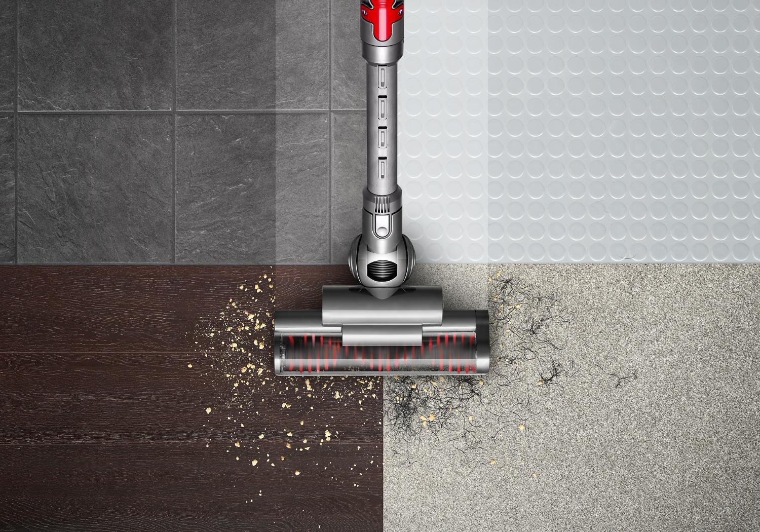 Dyson DC37 cleaner head picking up debris across multiple surfaces.