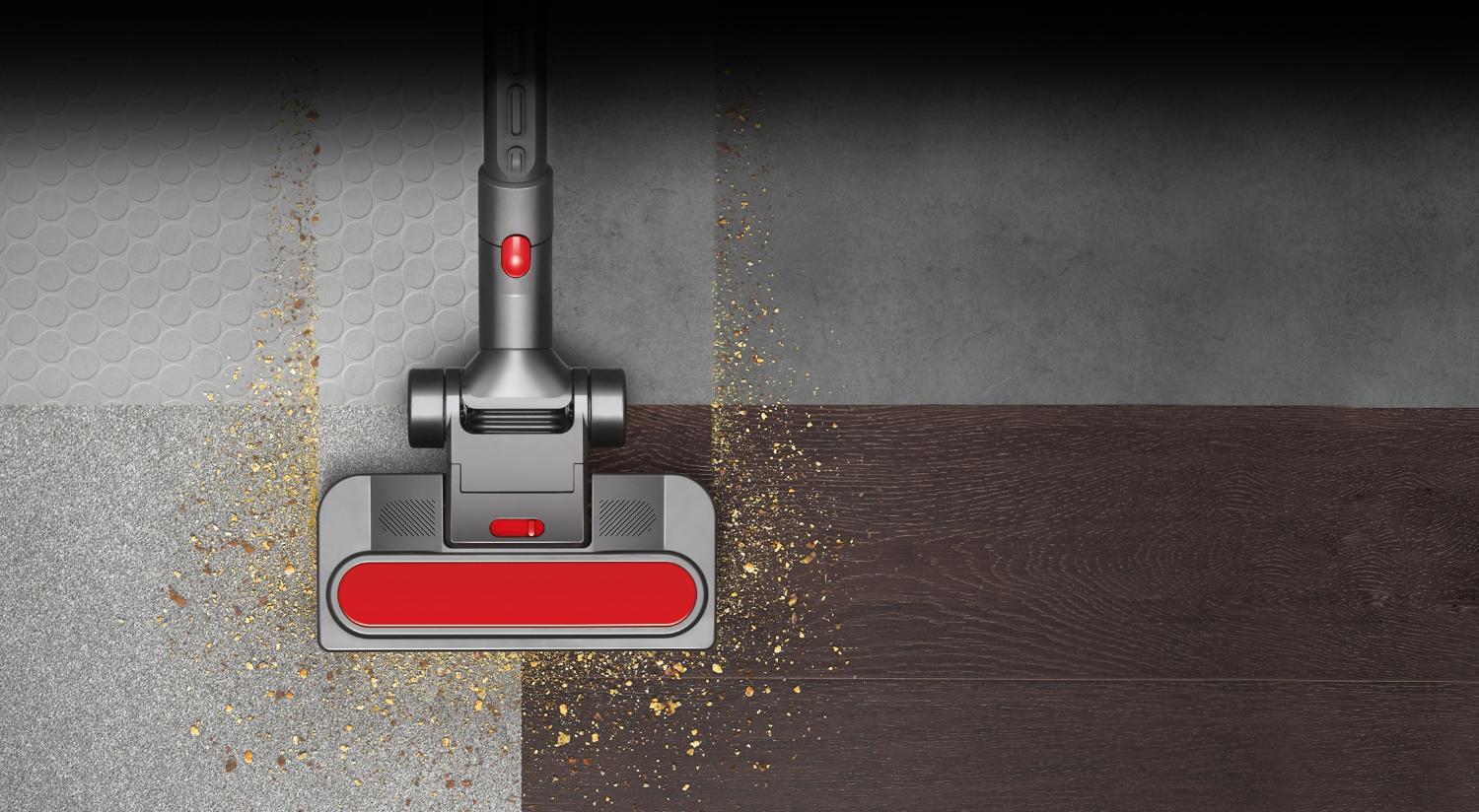 Die Dyson Cinetic Big Ball™ Bodendüse bewegt sich über einen grauen Teppich.