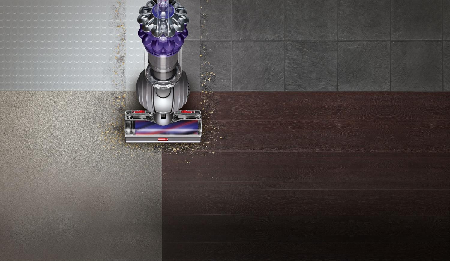Aerial view of Dyson Small Ball™ vacuum cleaner cleaning on carpet and tiles