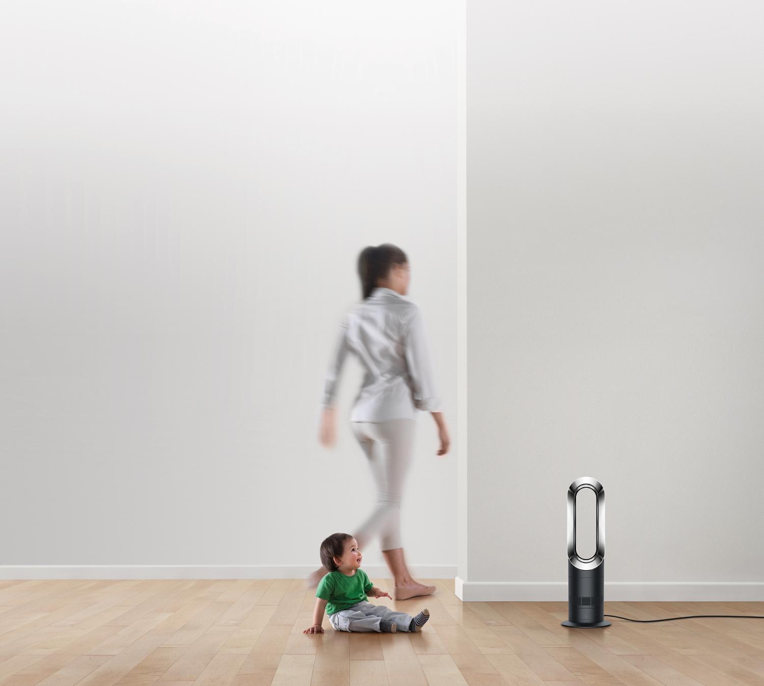 Child with Dyson fan heater
