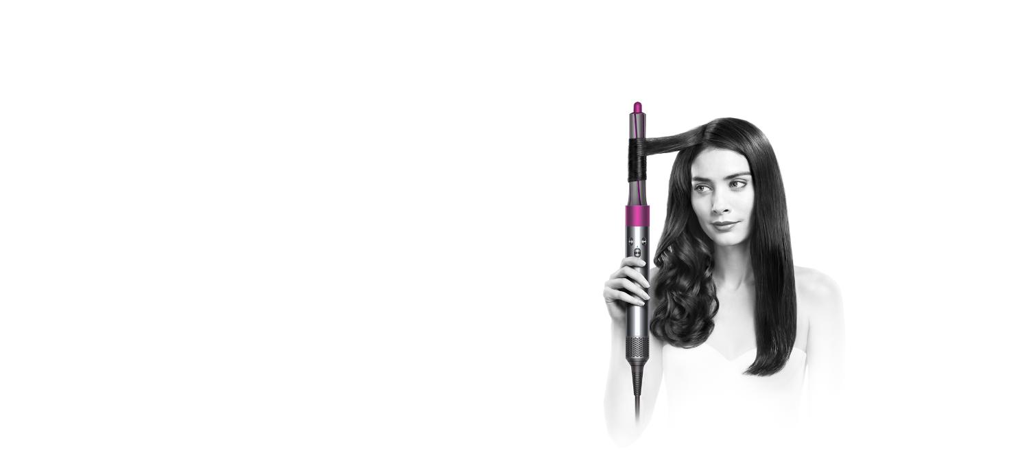 Model using Dyson Airwrap™ styler