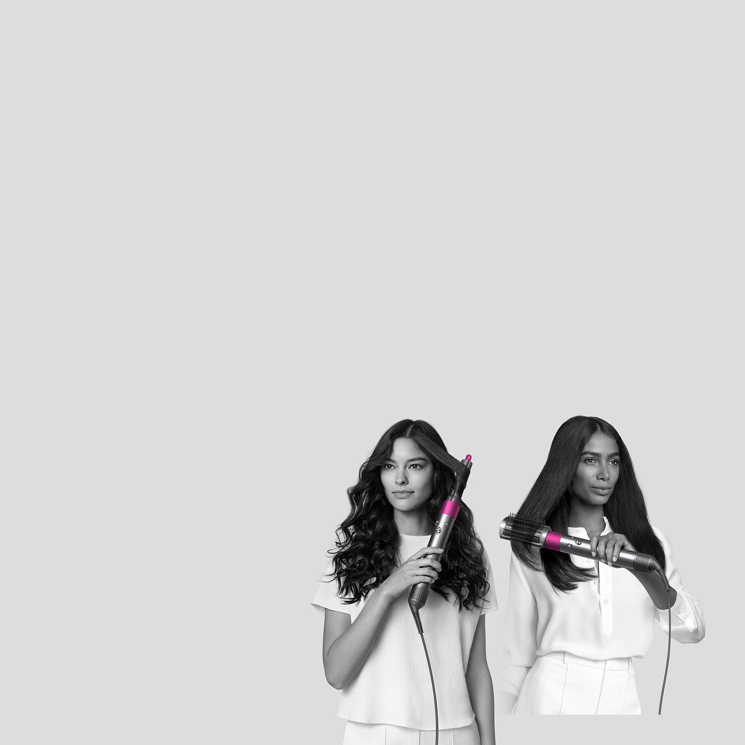 Woman curls her hair with Dyson Airwrap styler