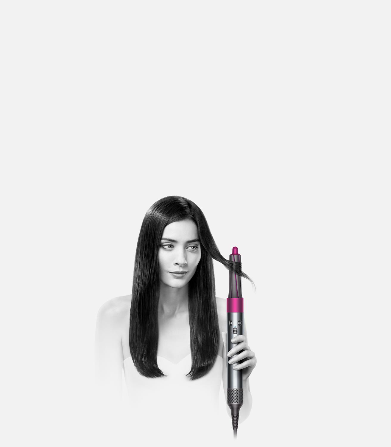 Model demonstrating the Dyson Airwrap™ hair styler on straight hair