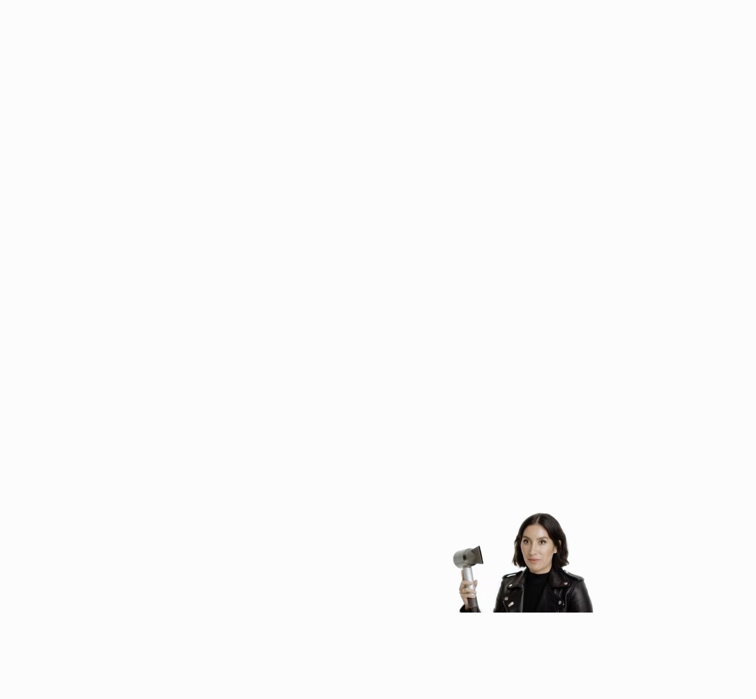 Jen Atkin holding the Dyson Supersonic™ hair dryer Professional edition with Professional concentrator attached