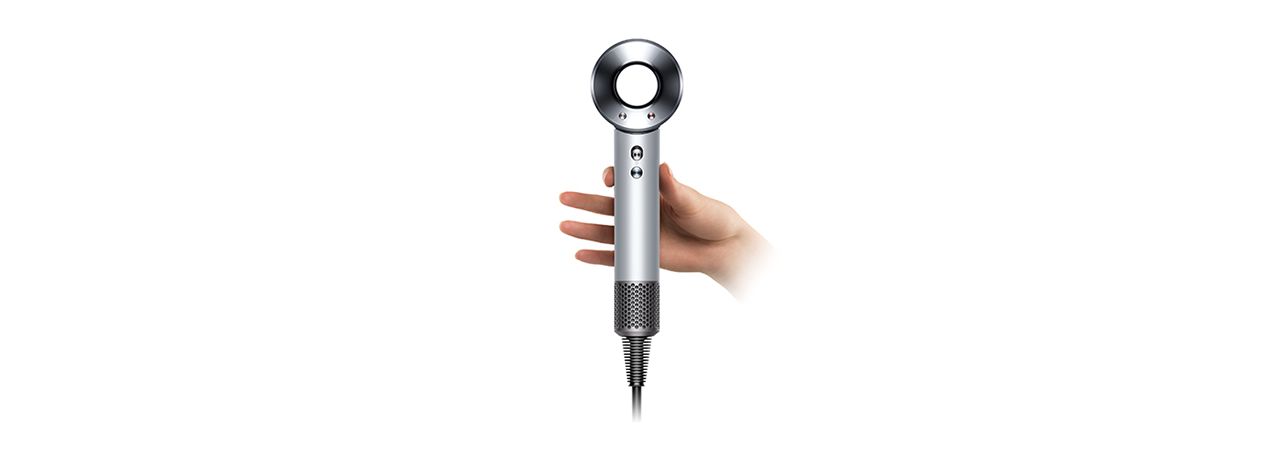 Dyson supersonic hair dryer light in hand