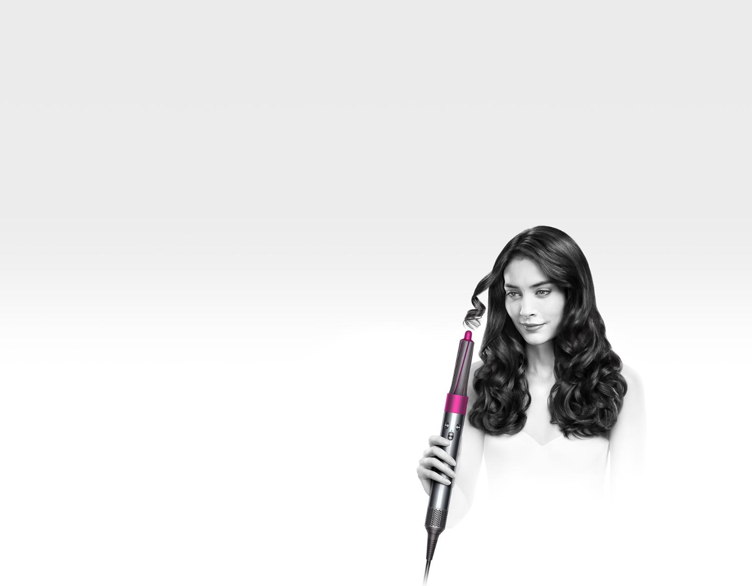 Model using Dyson Airwrap™ styler