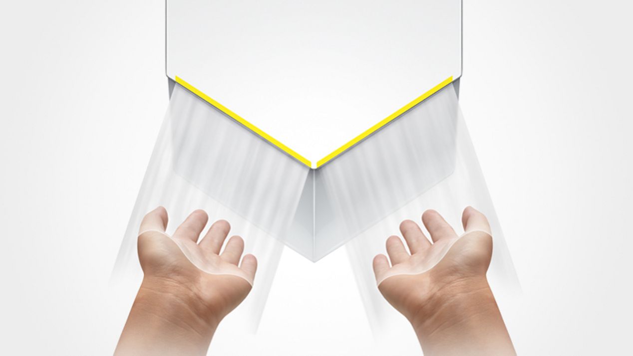 Hands under white Airblade V hand dryer airblade-v-variant-features-02-white