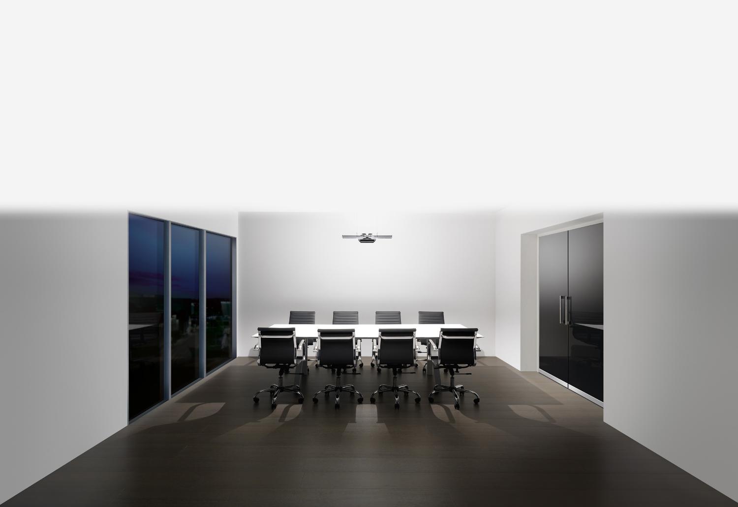 Dyson Cu-Beam Duo Pendelleuchte in einem Besprechungszimmer