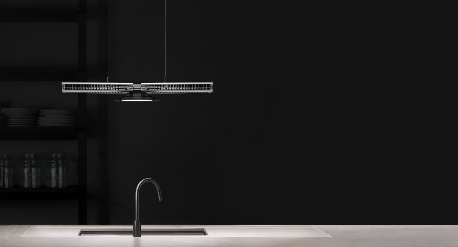 Cu-Beam suspended lighting illuminating an office