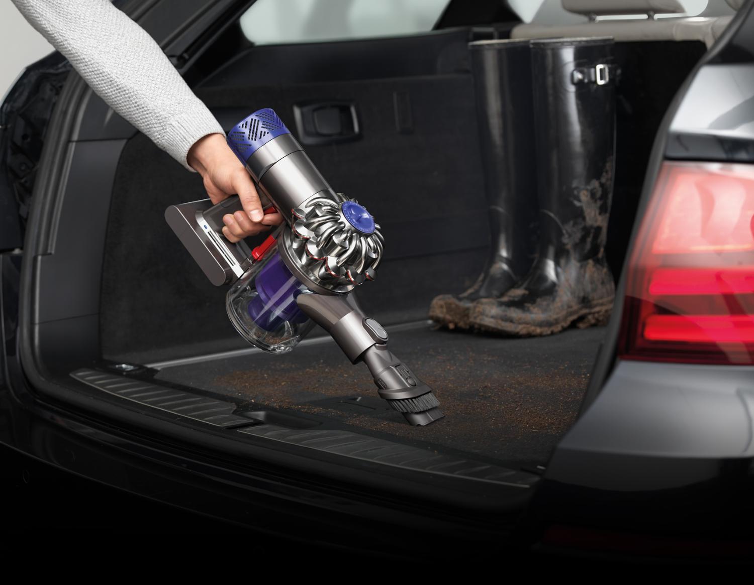 Combination tool cleaning a car