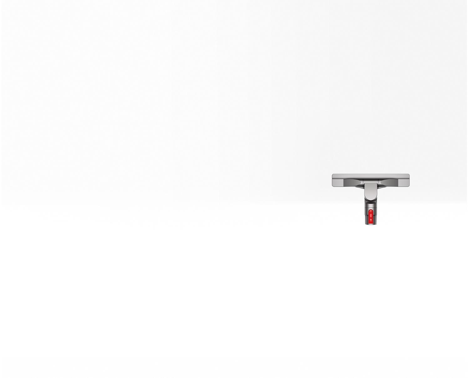 Brosse pour sols durs à détachement facile Gros plan sur la brosse pour sols durs articulée à détachement facile