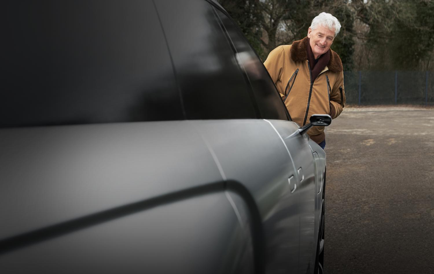 James Dyson looking at the Dyson Battery Electric Vehicle