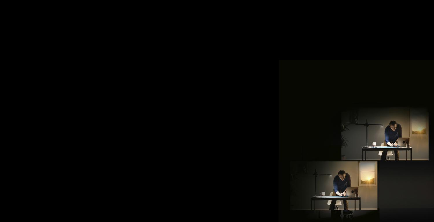 The Dyson Lightcycle™ task light adjusting with daylight outside a window