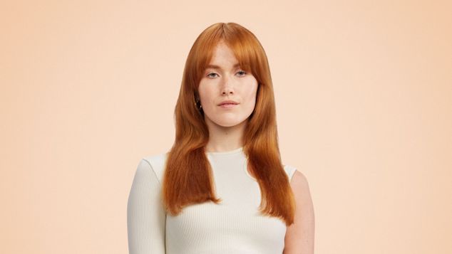 Model wears lob waves hairstyle