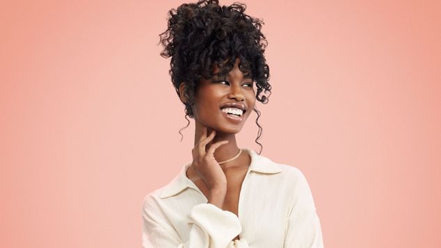 Model wears lob waves hairstyle