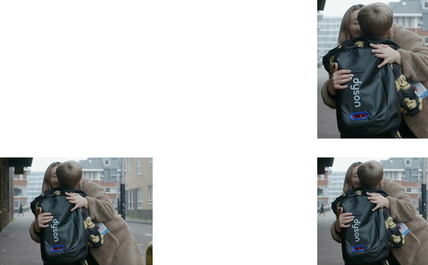 Victoria Koblenko knuffelt haar zoon die de Dyson backpack draagt