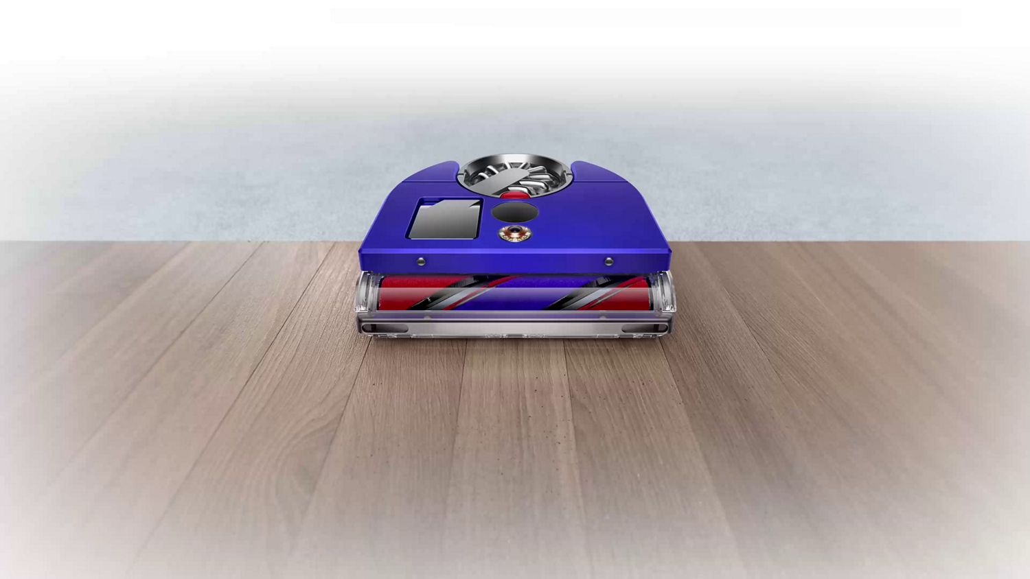 Aspirateur robot passe sur un parquet