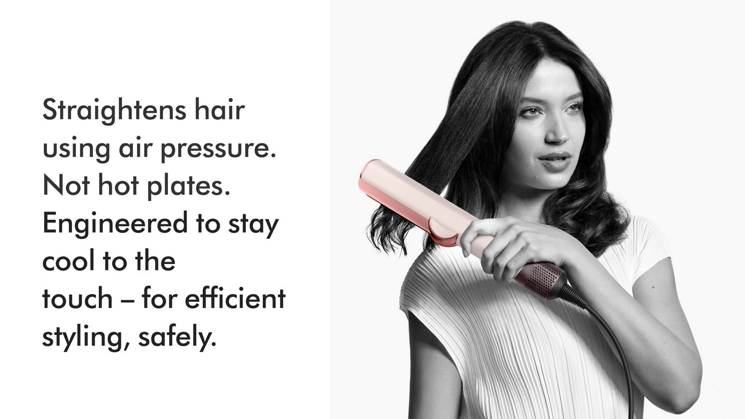 A model showing off her hair styled using the Dyson Airstrait straightener.