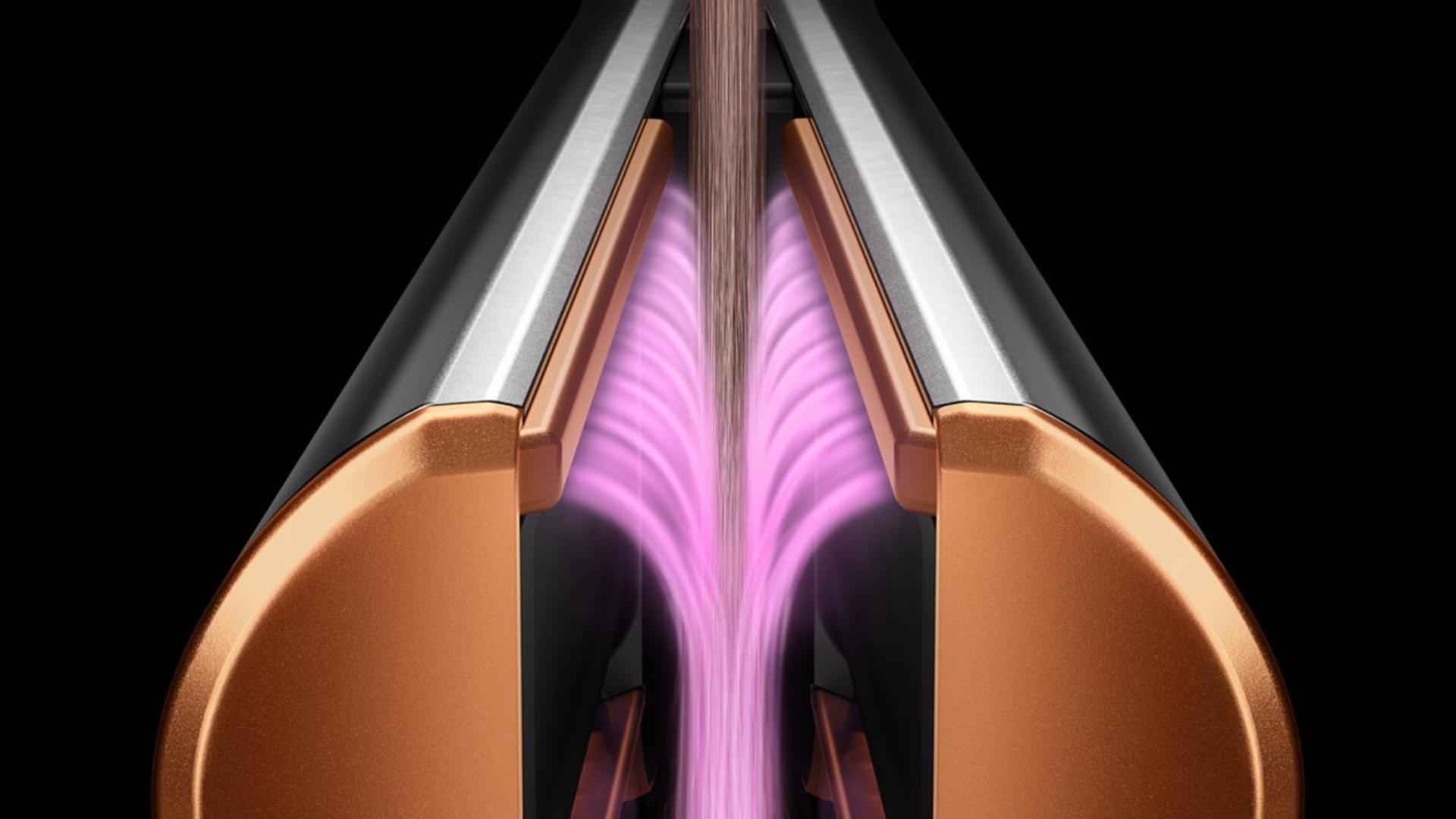 Kolları kilitli Dyson Airstrait saç düzleştirici. Hava akımının yönünü gösteren pembe grafik katmanları.