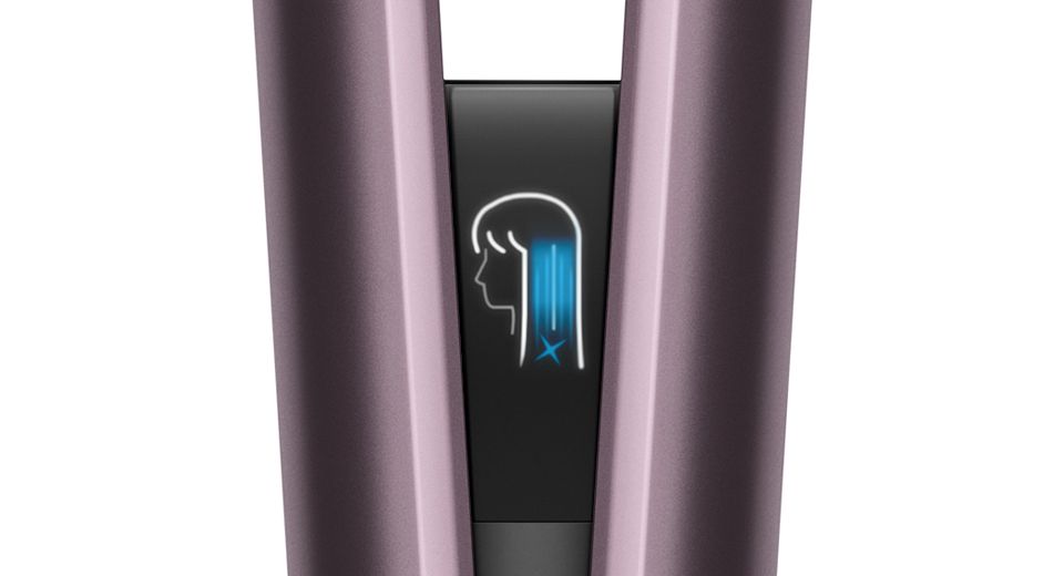 Close-up of the Dyson Airstrait's LCD screen showing the selected settings.