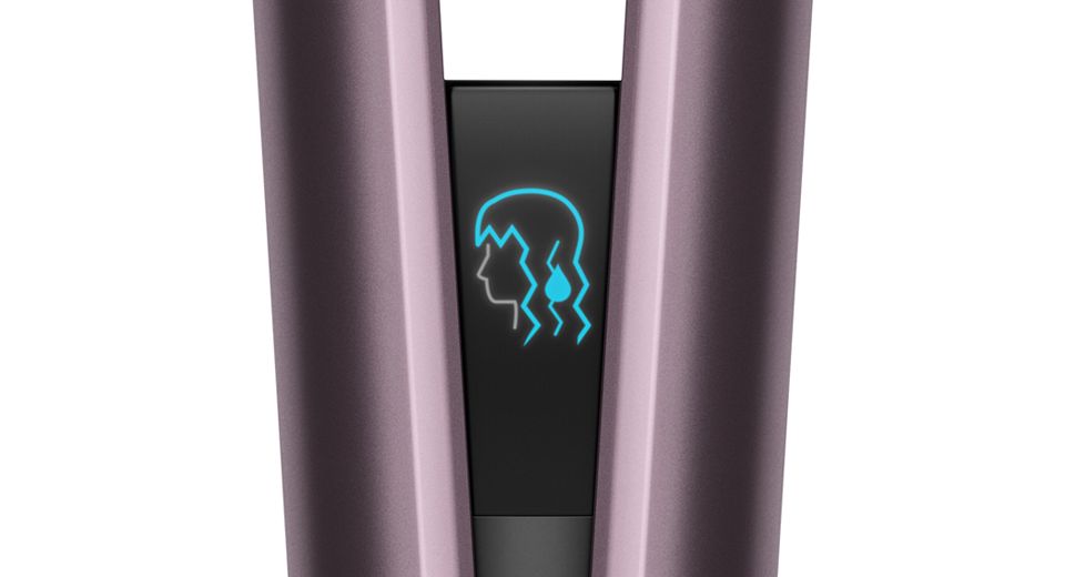 Close-up of the Dyson Airstrait's LCD screen showing the wet mode icon.