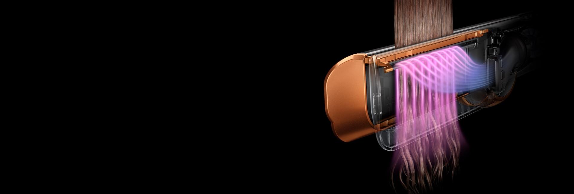 Aşırı ısı olmadan saçı düzleştirmek için Dyson Airstrait'in havayı nasıl şekillendirdiğini gösteren kesit grafik.
