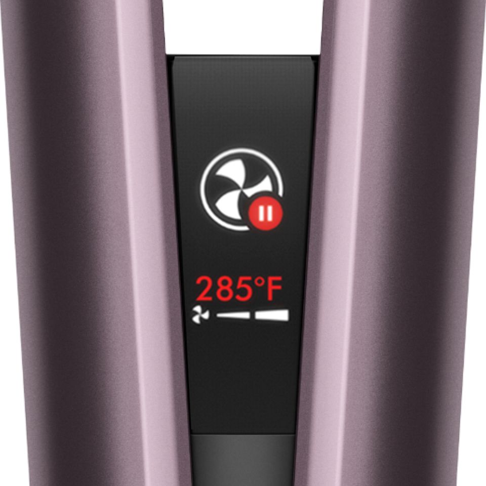 Close-up of the Dyson Airstrait's LCD screen showing the device has automatically paused.