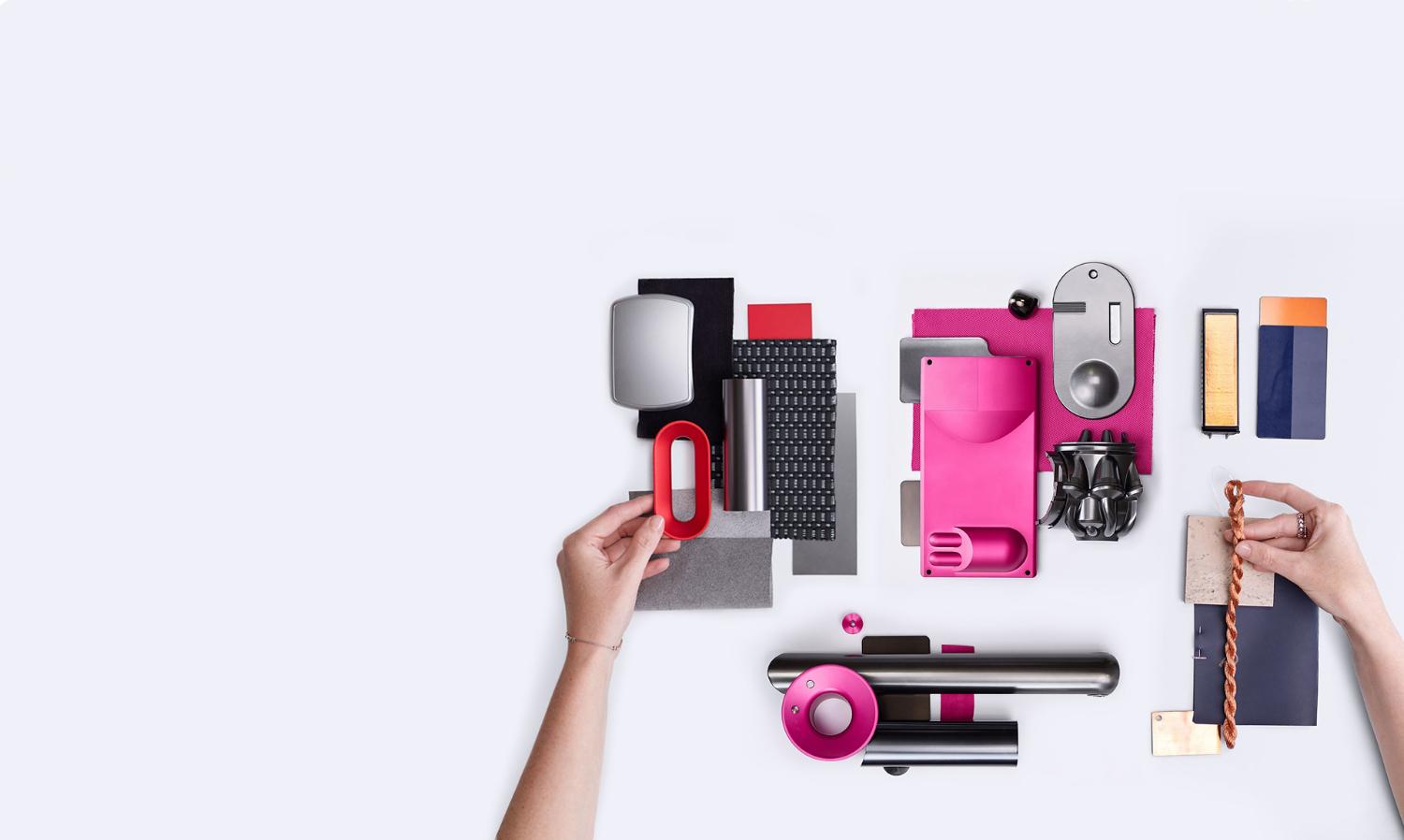 A selection of different materials and Dyson spare parts in vibrant colours.