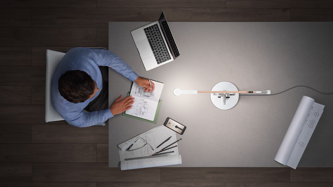 Man sat at home office desk
