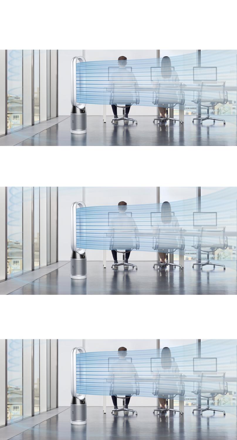 A Dyson Pure Cool tower fan projecting airflow to cool workers in an office setting