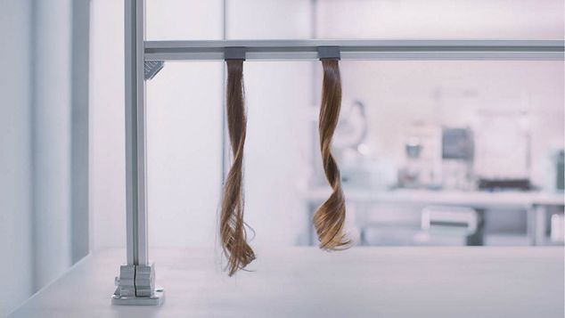 Hair strands being tested for retention