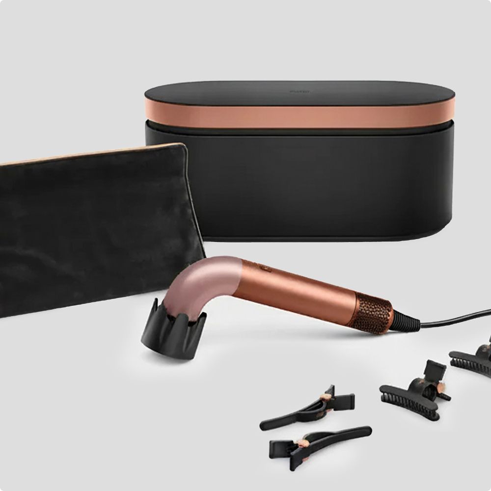 The Dyson Supersonic R with a presentation case and travel bag.