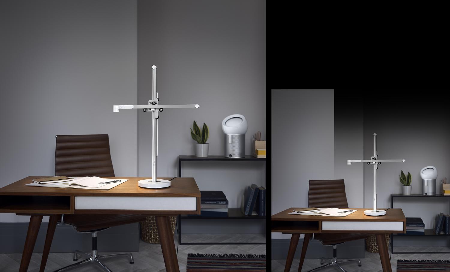 Home office with a Dyson Lightcycle task light and a Dyson Pure Cool Me purifying fan