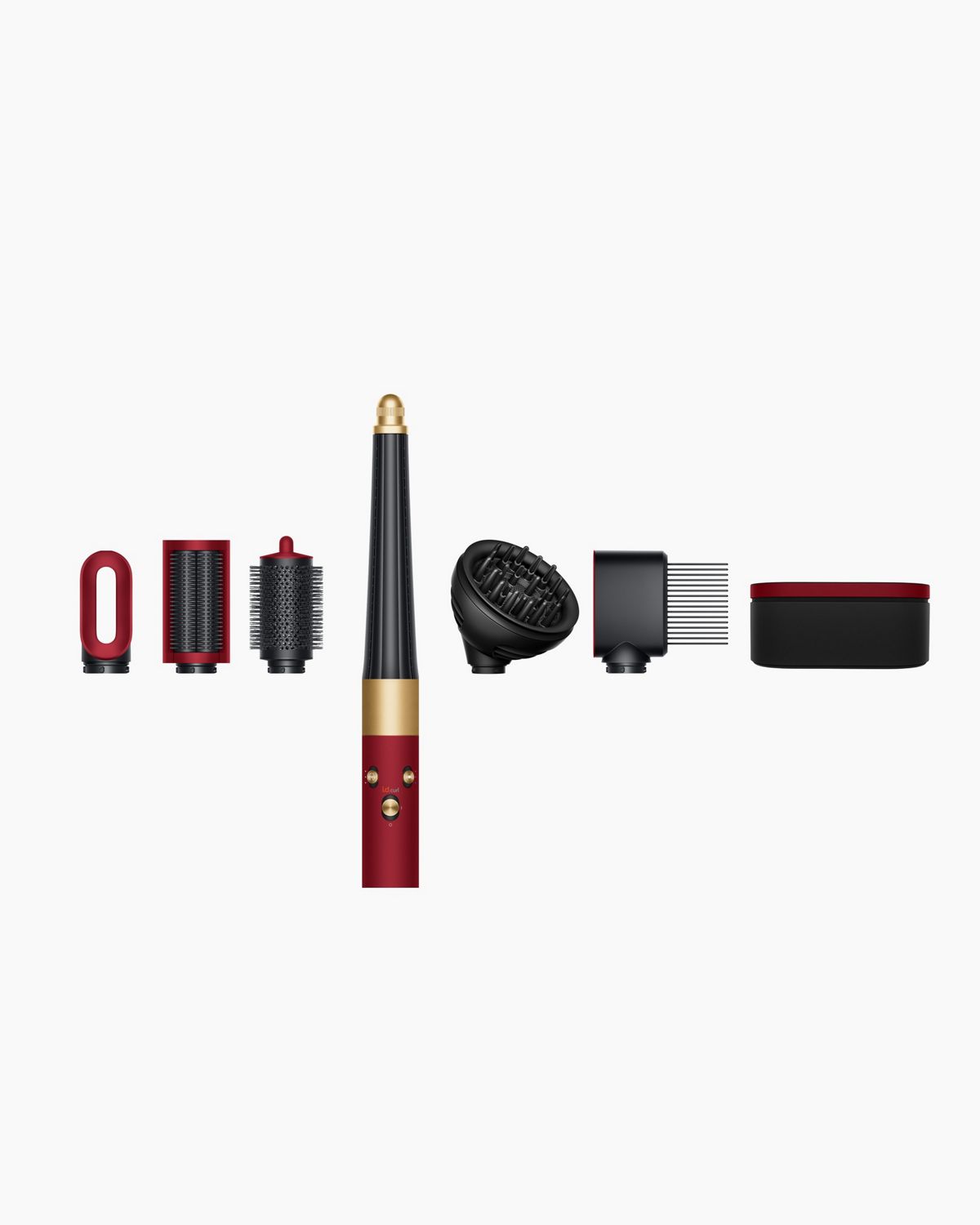 The Dyson Airwrap i.d. Curly + Coily with all its attachments by its side.