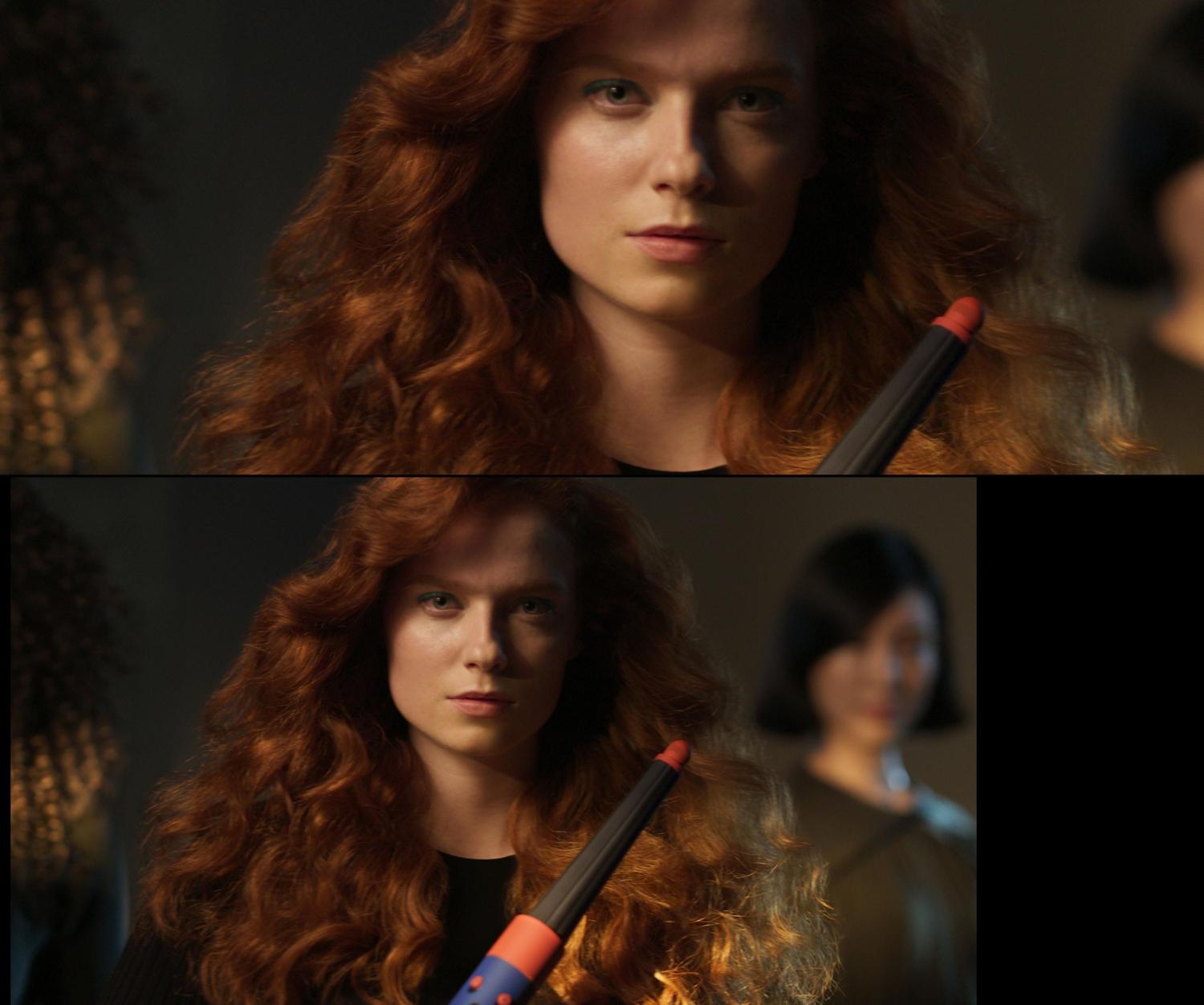 A redhead model shows off her wavy hair, styled using the Conical Airwrap barrel attachment.