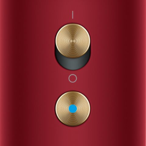 The power and Cold-shot buttons on the Dyson Supersonic Nural hair dryer.