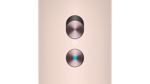 Close-up of the Dyson Supersonic hair dryer's cold shot button.
