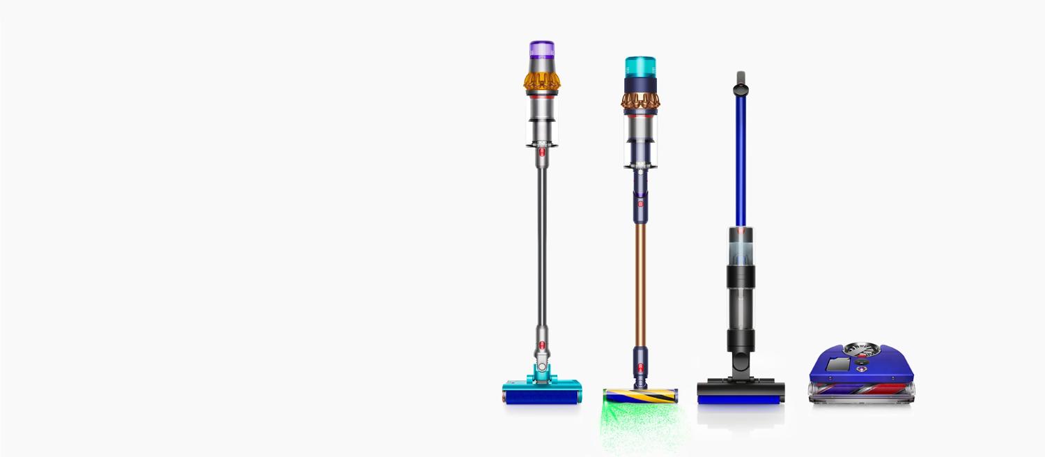A line up of various Dyson floor cleaning machines.