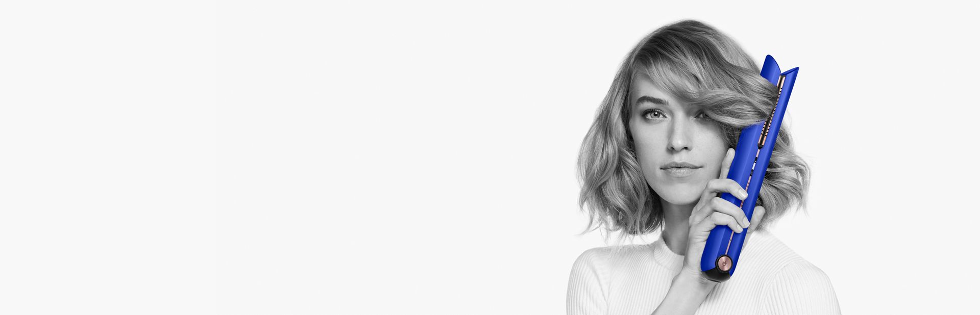 A model using the Dyson Corrale straightener
