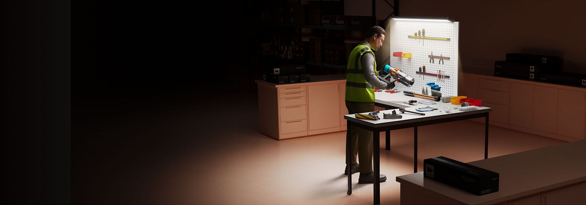 A Dyson operator inspects a Certified Dyson Refurbished vacuum cleaner.
