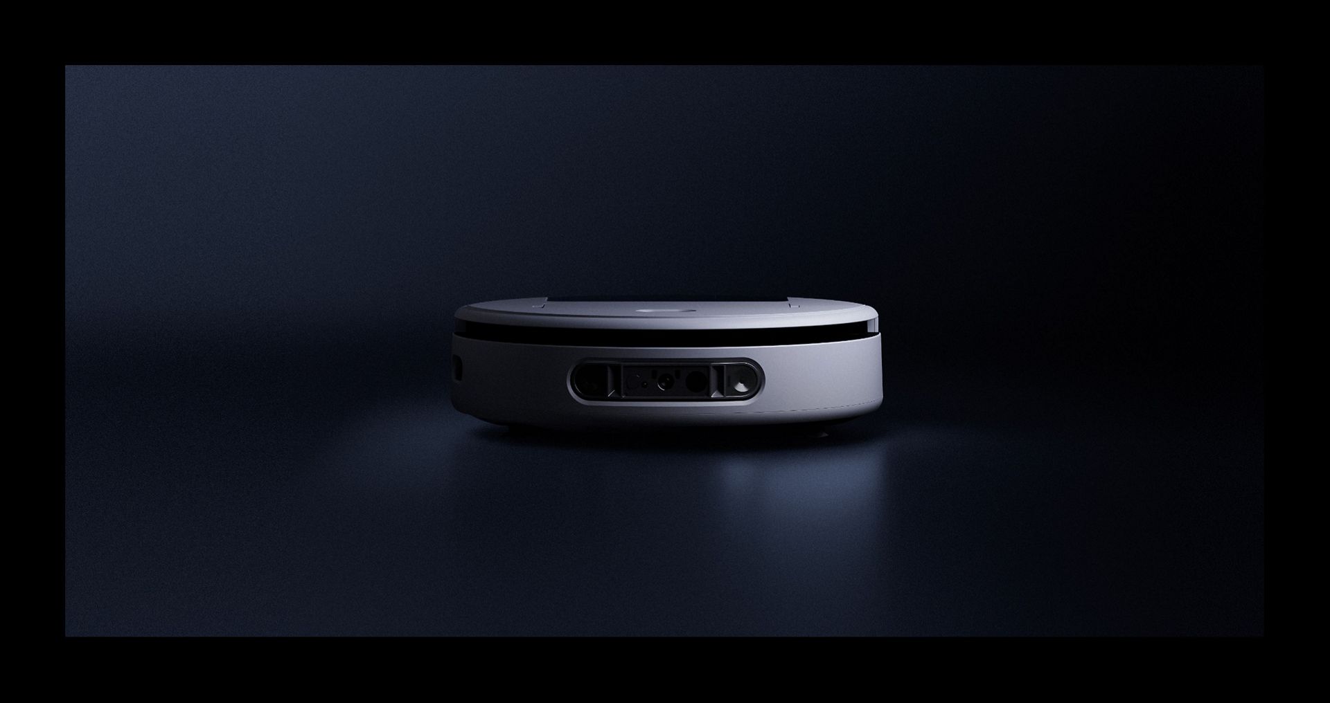 Dyson Nurovi robot vacuum on a dark background.