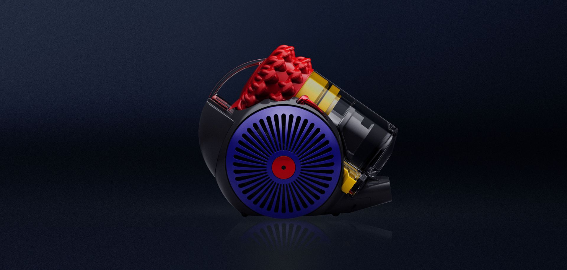 Dyson Big Ball Konical vacuum cleaner on a dark background.