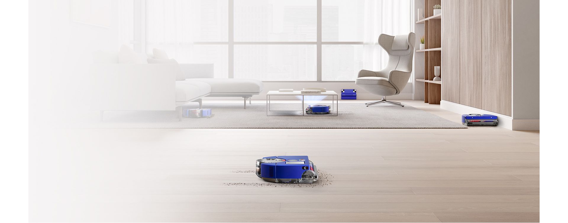 Man in a home using the Gen5detect Absolute vacuum cleaner while another man meditates while the Dyson 360 Vis Nav robot vacuum cleaner cleans a dirty floor