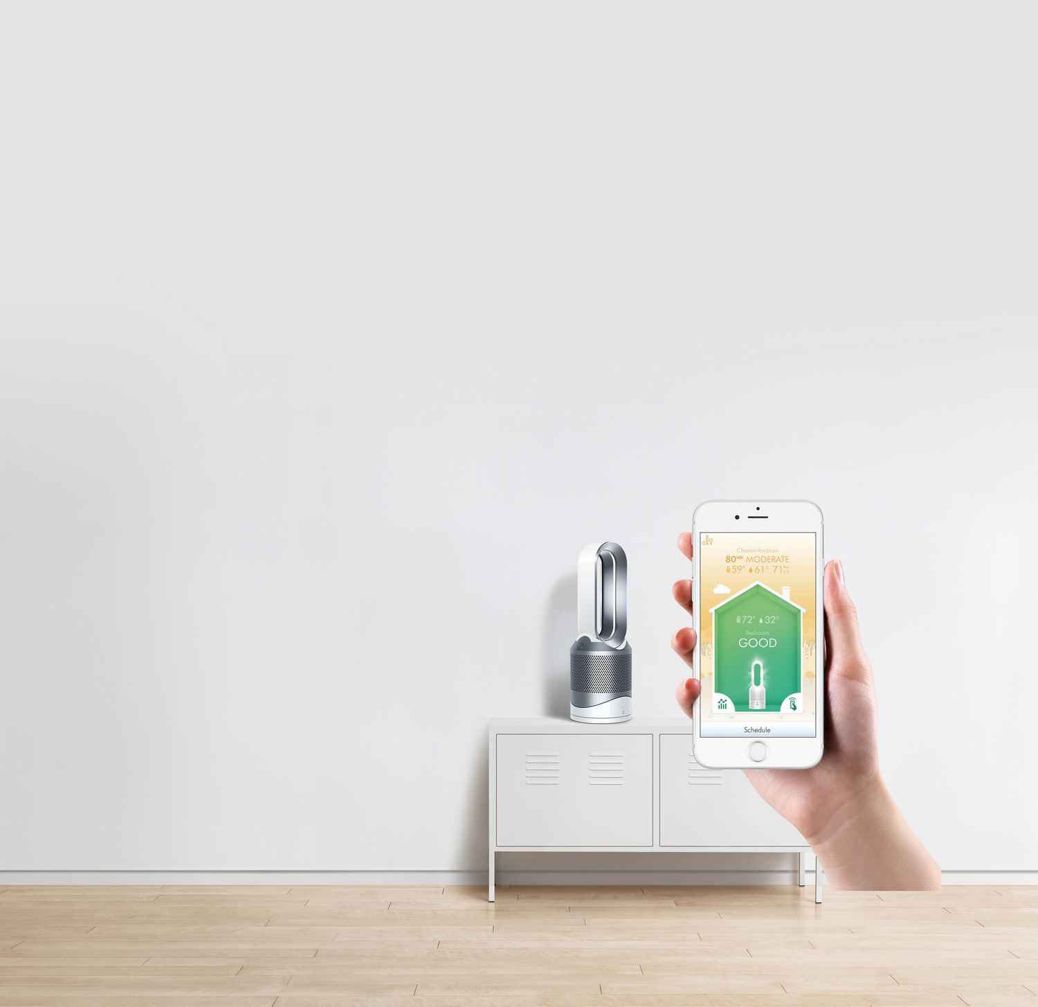 Purificateur Dyson près d’un iPhone et de l’application