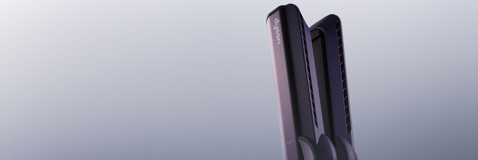 The Dyson Airstrait straightener in Jasper plum.