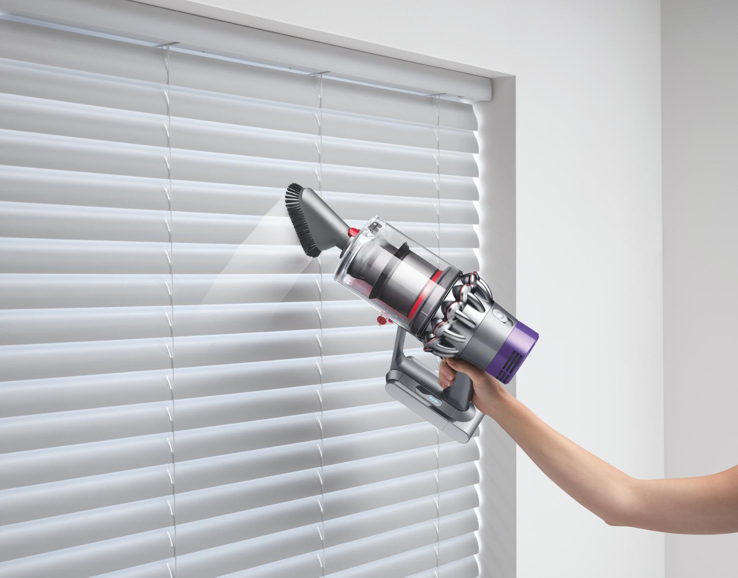 Mini soft dusting brush attached to a Dyson Cyclone V10