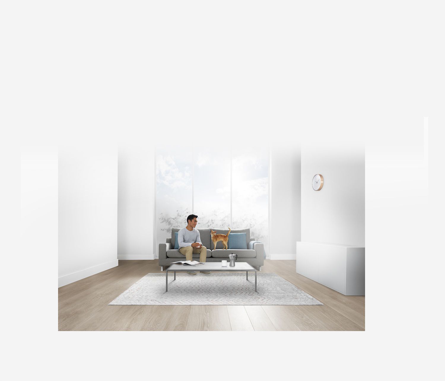 Man sat on sofa with his cat