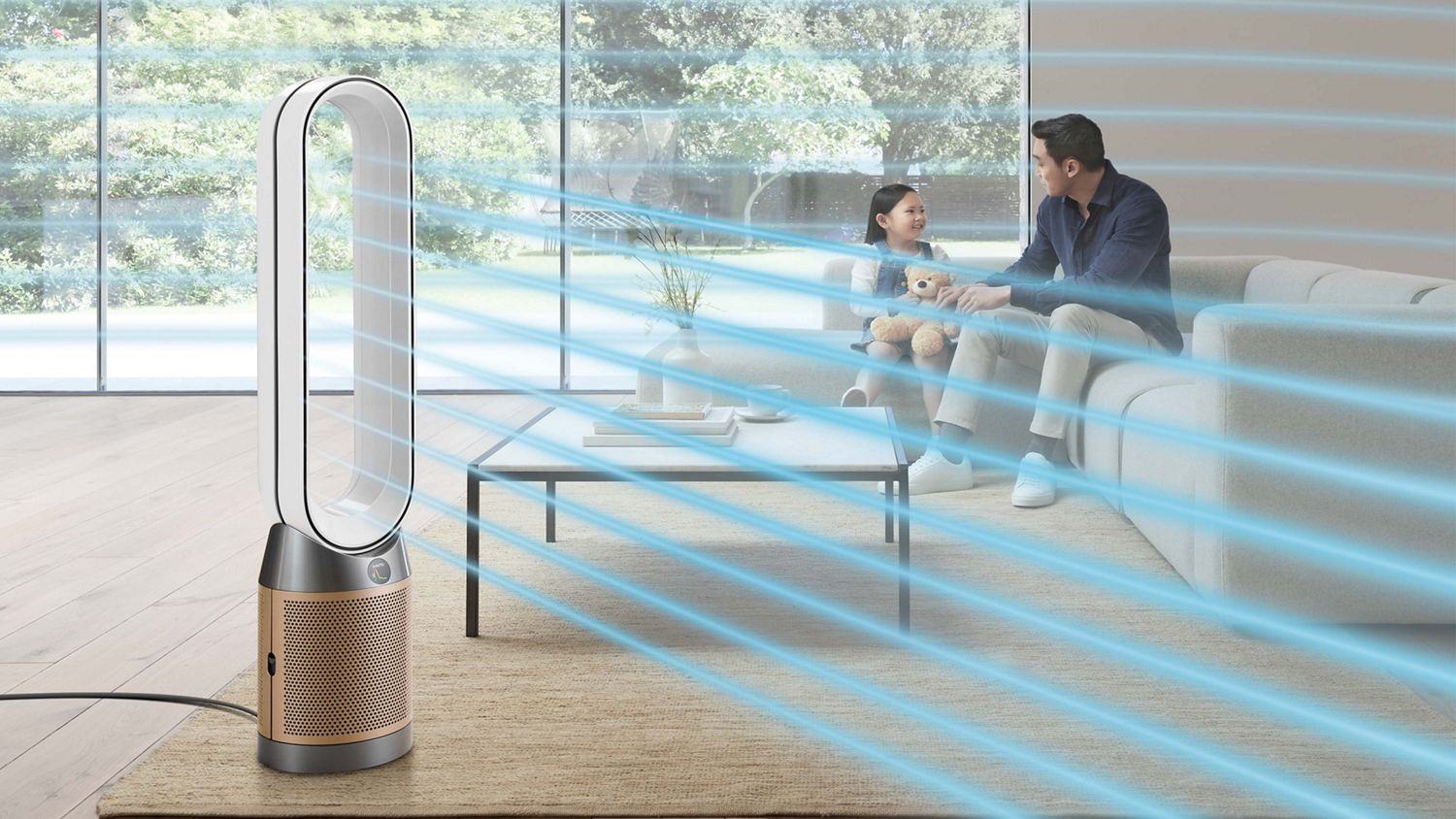 Dyson air purifier circulates cleaner air in living room and girl sits chatting to her father on sofa