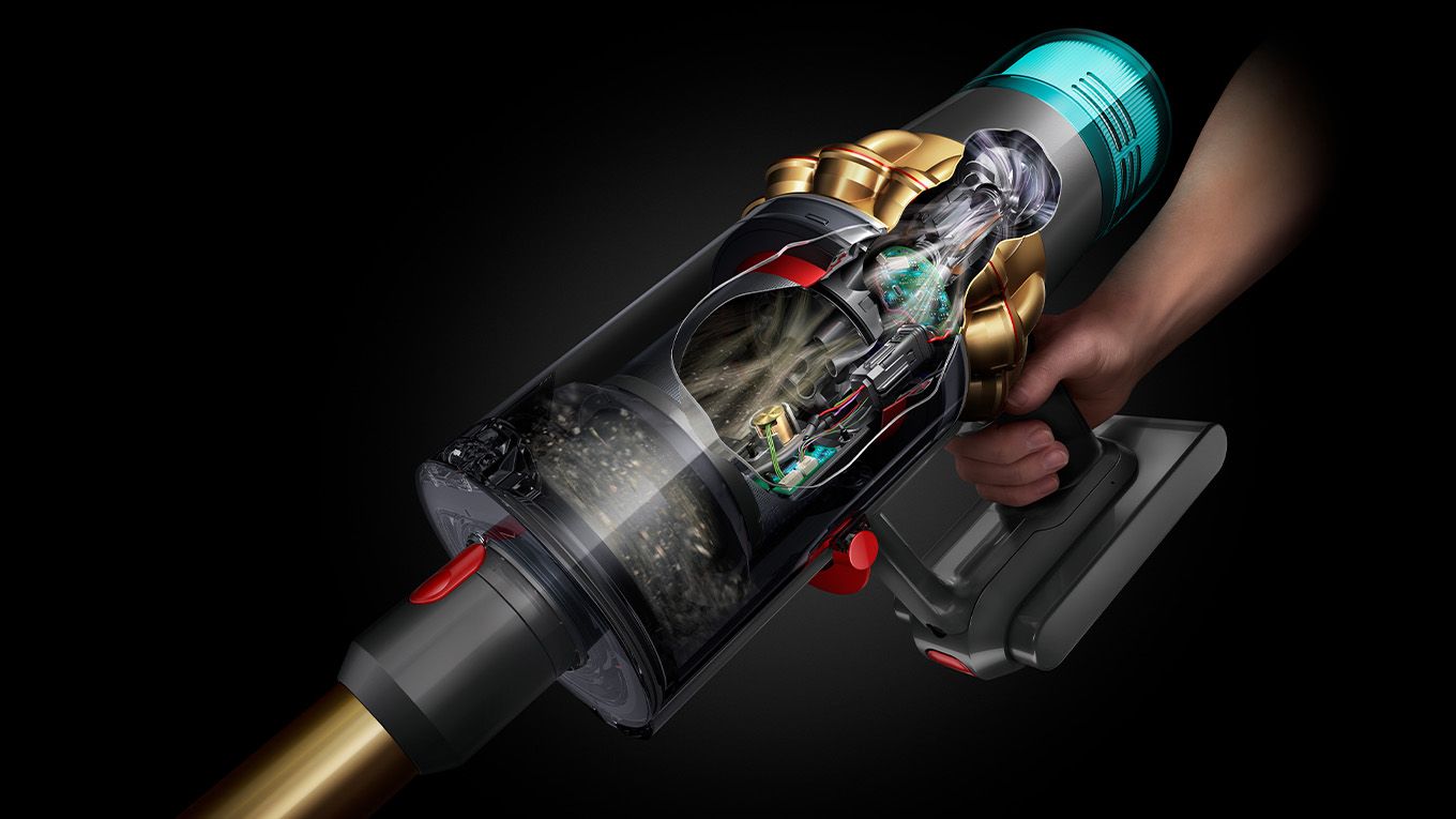 Dyson vacuum picking up dust