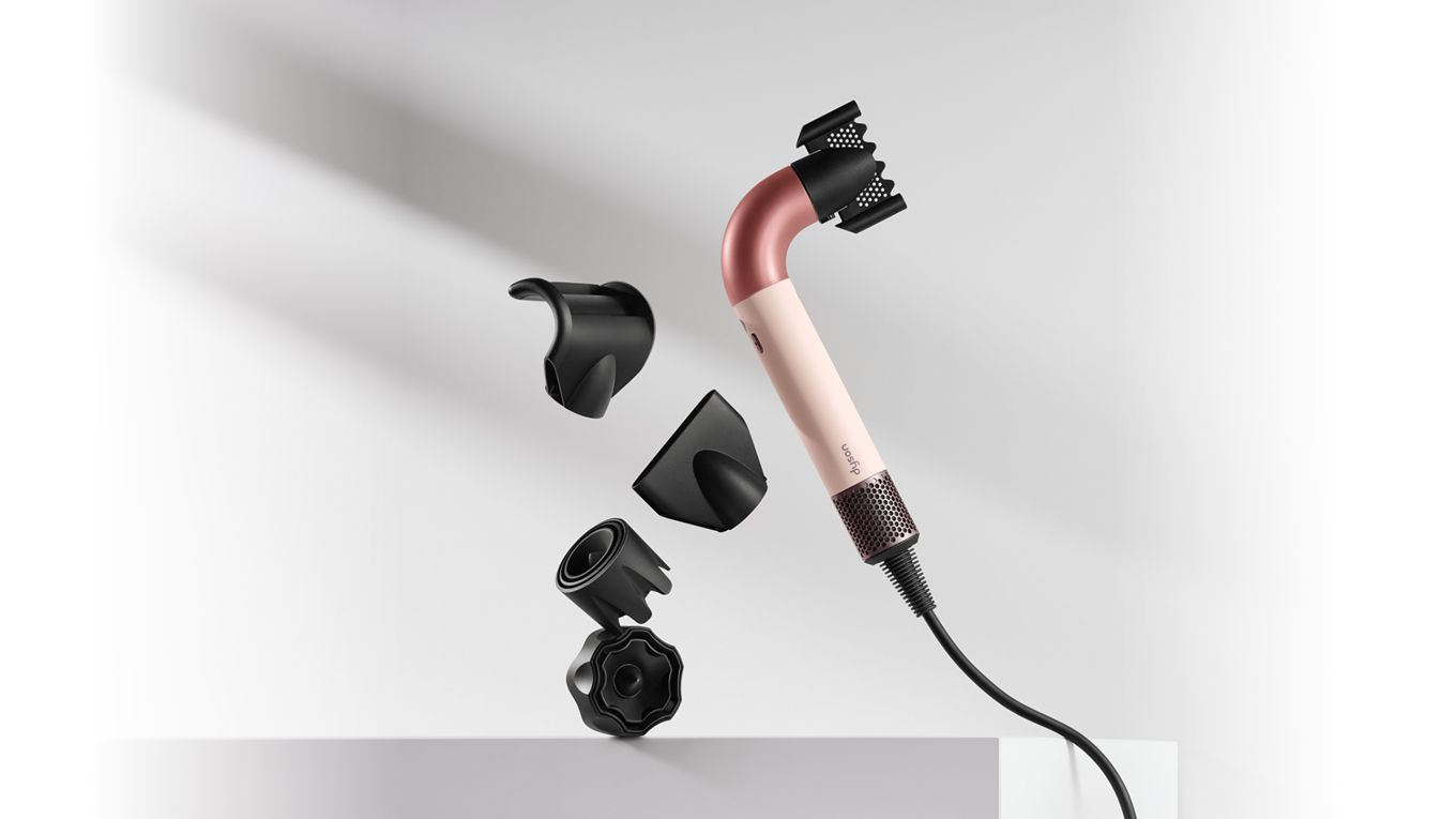 The Dyson Supersonic r hair dryer with a range of accessories.